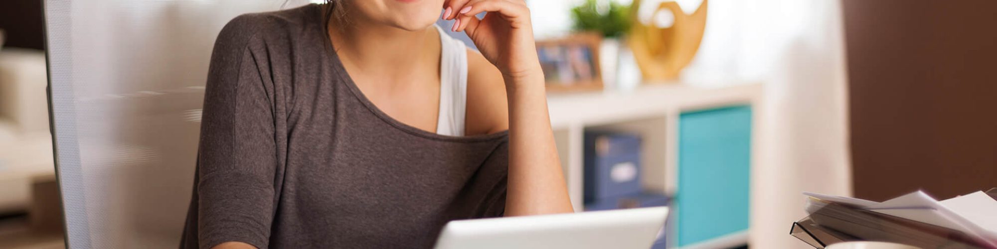 portrait-of-happy-woman-with-digital-tablet-in-hom-5JCSVAX.jpg